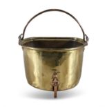 A LATE 19TH CENTURY COPPER AND BRASS FUEL BUCKET, with swing handle, flat back and raised on three