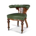 AN EARLY VICTORIAN OAK AND LEATHER UPHOLSTERED COCK FIGHTING OR READING CHAIR, the 'horseshoe' top