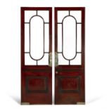 A PAIR OF MAHOGANY RECEPTION DOORS, of rectangular form with compartmented glazing with brass and