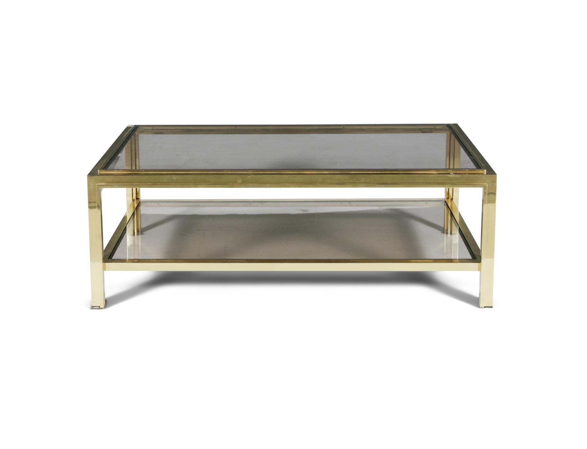 COFFEE TABLE A two tier brass coffee table, with smoked glass tops, Italy c.1960.