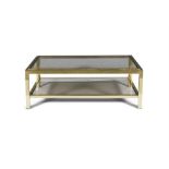 COFFEE TABLE A two tier brass coffee table, with smoked glass tops, Italy c.1960.