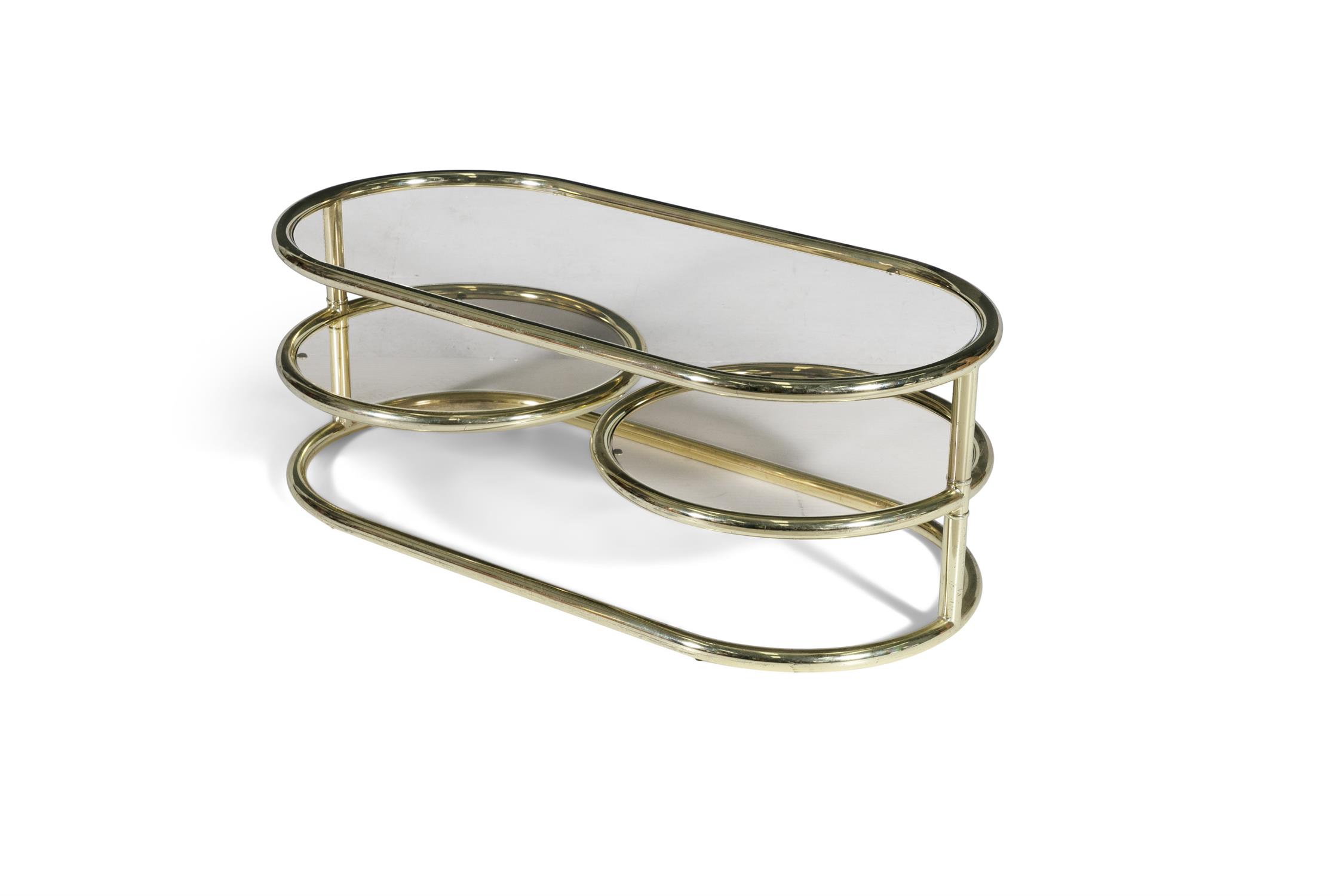 COFFEE TABLE A two tier brass coffee table, with smoked glass tops, the lower circular tops with