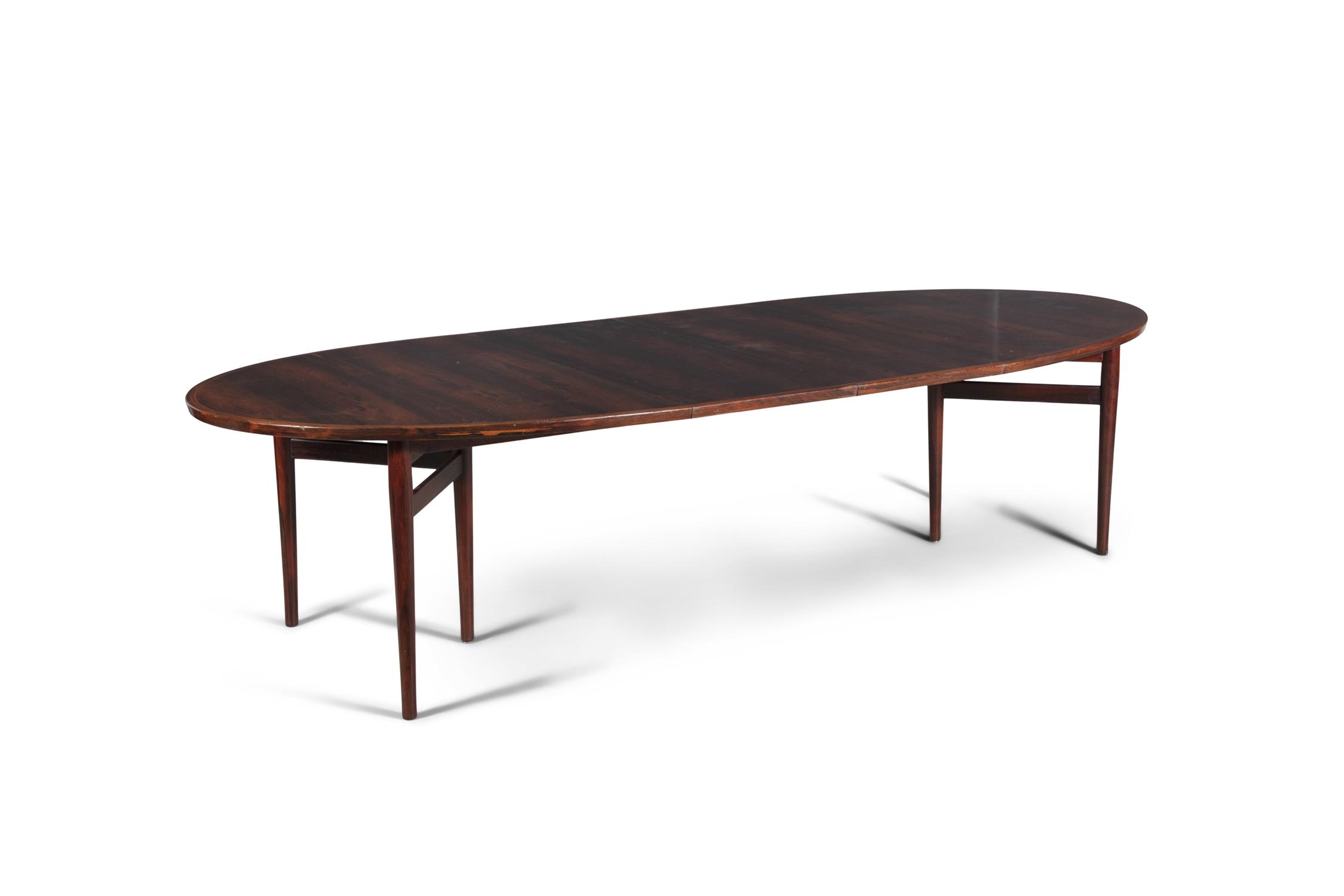ARNE VODDER (1926-2009) A rosewood 'model 212' extending oval dining table by Arne Vodder,