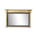 A GEORGE IV GILTWOOD FRAMED OVERMANTLE MIRROR, with ebon slip, the moulded cornice with ball