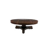 A 19TH CENTURY LOW ROSEWOOD CIRCULAR TABLE, raised on turned centre column, on triangular platform
