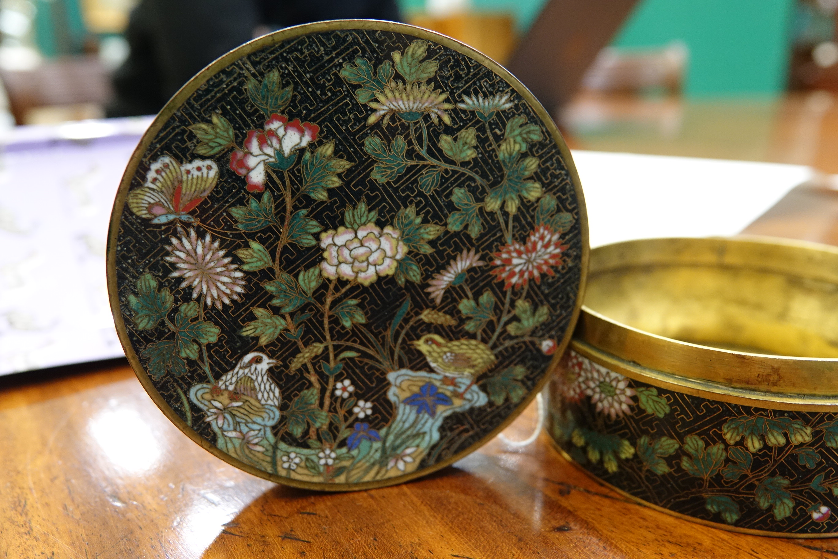 A 'FLOWER AND ROCKS' ROUND CLOISONNE BOX AND COVER China, Late Qing to Republican / Minguo period - Image 3 of 36