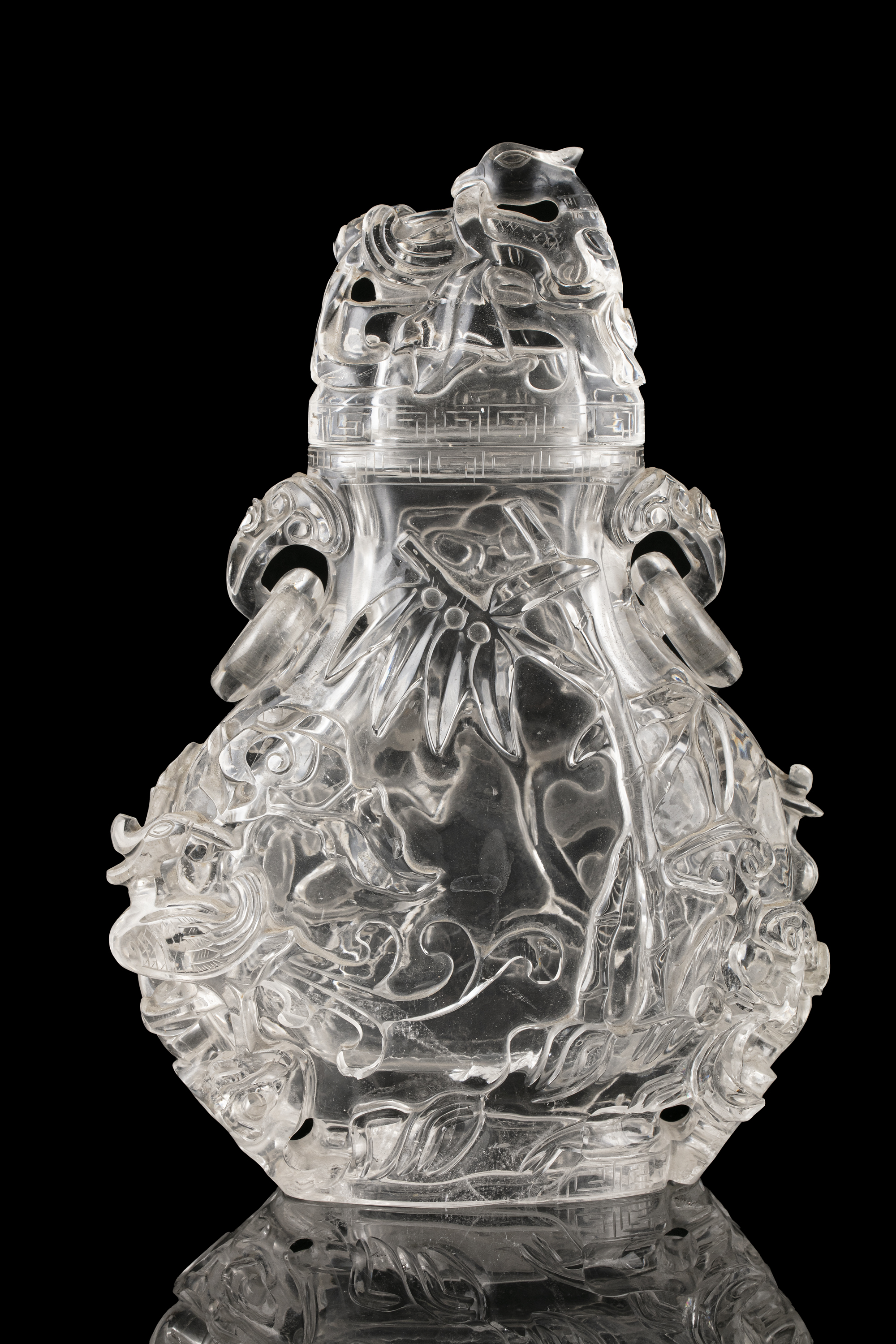 A LARGE ROCK-CRYSTAL LIDDED VASE WITH LOOSE RINGS HANDLES China, Qing Dynasty, 19th century Carved