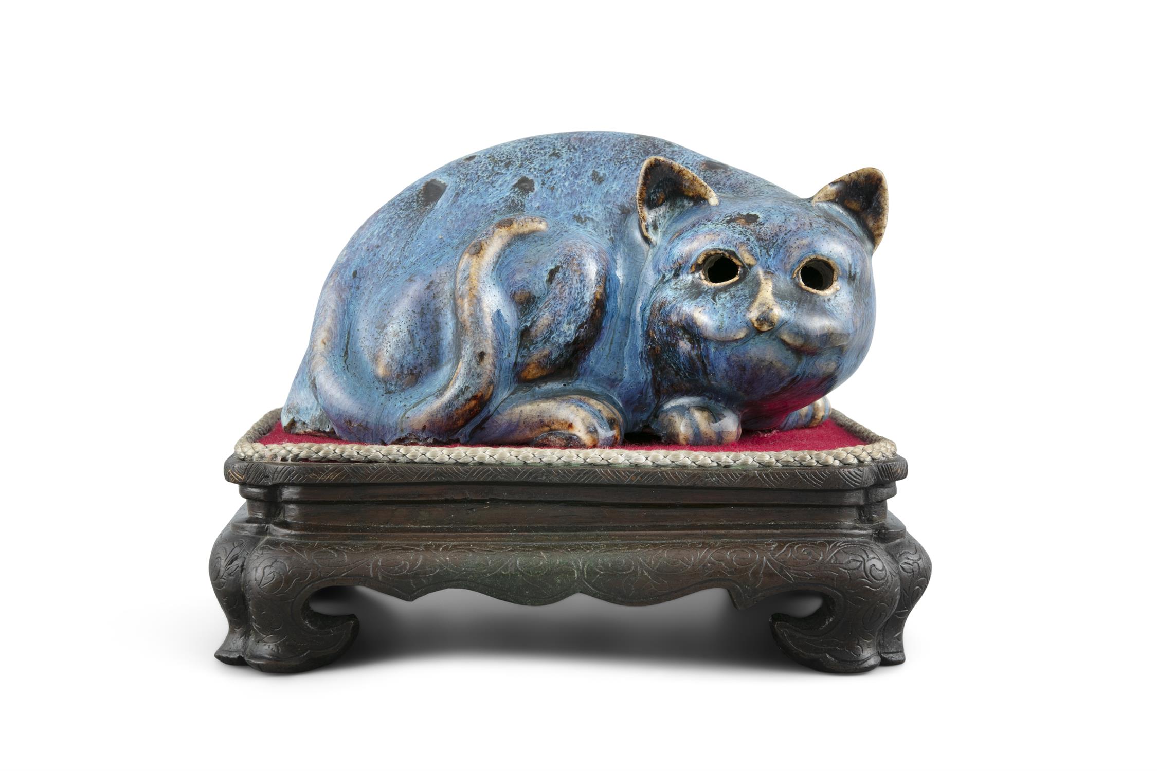 A ROBIN EGG PORCELAIN CAT NIGHT LIGHT China, Qing Dynasty Molded as a crouching cat, with a hole