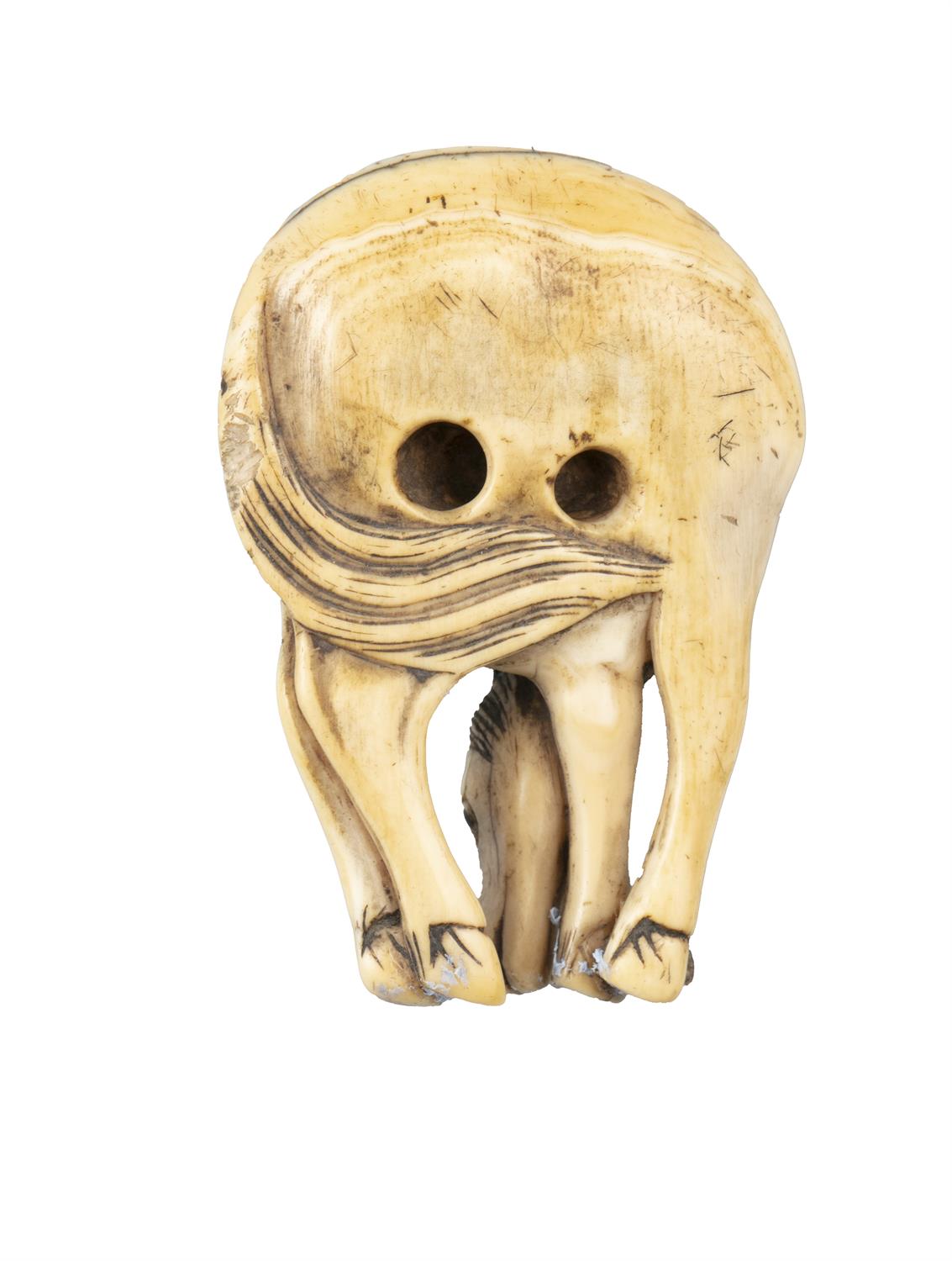 *AN IVORY 'GRAZING HORSE' KATABORI NETSUKE Japan, Edo period Unsigned. Pierced with two himotoshi. - Image 6 of 6