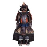 A NATURAL AND LACQUERED WROUGHT IRON SAMURAI SUIT OF ARMOUR OF HATOMUNE DO TYPE, WITH AN OBOSHI