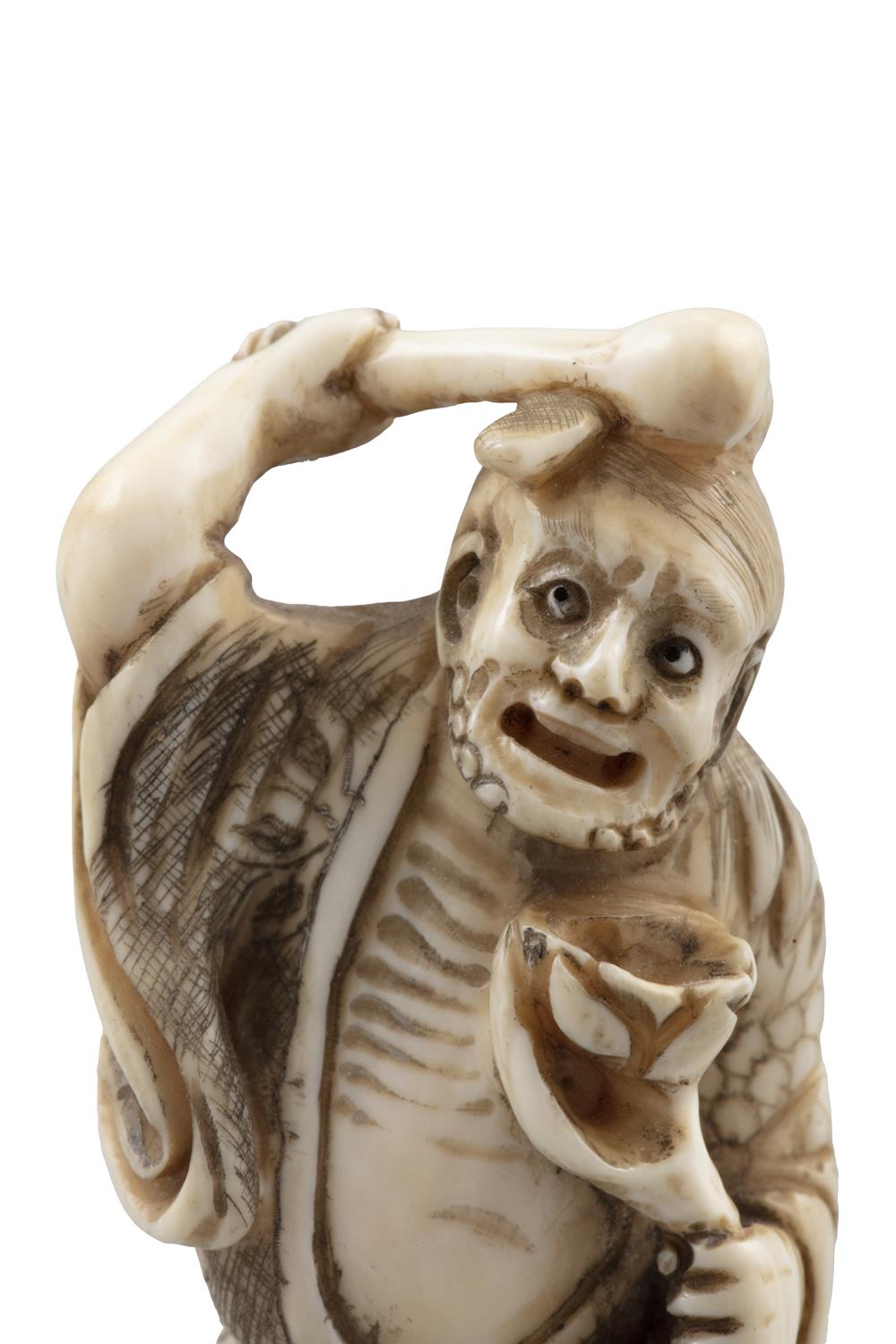 *TAKENOBU 武信 - AN IVORY 'ONI' KATABORI NETSUKE Japan, 19th century Pierced with two himotoshi. - Image 10 of 10