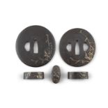 A PAIR OF DAISHO TSUBAS Japan, Edo period Both of naga maru gata type, for a daïsho (twin katana and