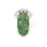 AN ART DECO JADE, DIAMOND AND RUBY CLIP BROOCH, CIRCA 1935 The central jade plaque carved to