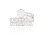 A DIAMOND DRESS RING, BY ADLER Composed of a coiled hoop set with brilliant-cut diamonds to the