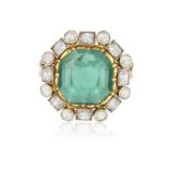 AN EMERALD AND DIAMOND DRESS RING, CIRCA 1955 The central octagonal-shaped emerald weighing