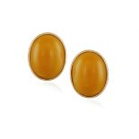 A PAIR OF AMBER EARRINGS, BY BUCCELLATI Each oval-shaped butterscotch amber cabochon within a