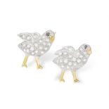 A PAIR OF DIAMOND AND COLOURED DIAMOND BROOCHES Each modelled as a chick, the body pavé-set with