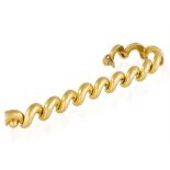 A GOLD BRACELET, BY CHAUMET Composed of wave links in polished gold, in 18K gold,