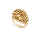 A GOLD RETRO RING, CIRCA 1950 Of bombé design with ropetwist detailing, mounted in 18K gold,