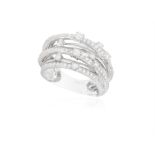 A DIAMOND DRESS RING The frontispiece composed of seven half hoops highlighted with