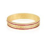 A RUBY-SET 'ATLAS' BANGLE, BY TIFFANY & CO., 1995 The hinged bangle with Roman numerals in