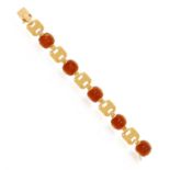 A CARNELIAN AND GOLD BRACELET, BY GEORGES LENFANT, CIRCA 1955 Composed of fancy polished gold