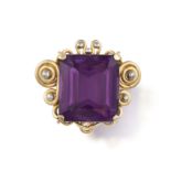 A RETRO AMETHYST BROOCH, CIRCA 1940 Composed of a square-cut amethyst weighing approximately 31.