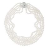 A CULTURED PEARL NECKLACE WITH DIAMOND CLASP, CIRCA 1960 Composed of five rows of graduated