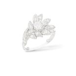 A DIAMOND DRESS RING, CIRCA 1960 Of floral design, centring a brilliant-cut diamond with
