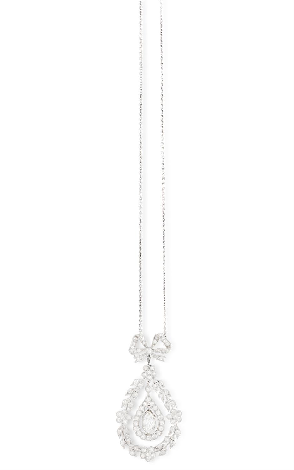 A BELLE ÉPOQUE DIAMOND PENDANT NECKLACE, CIRCA 1910 The openwork plaque of foliate design,