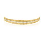 A DIAMOND BRACELET, CIRCA 1960 Composed of a series of graduated reeded links,