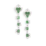 A PAIR OF EMERALD AND DIAMOND PENDENT EARRINGS Each surmount set with a trio of square-cut