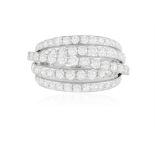 A DIAMOND DRESS RING Of openwork design, the five rows set with brilliant-cut diamonds,