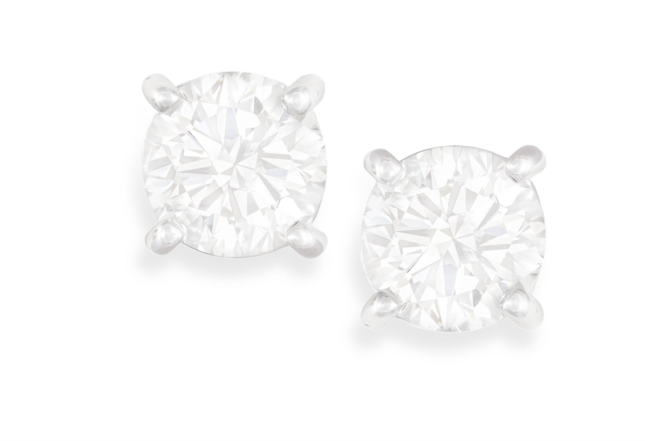 A PAIR OF DIAMOND EARSTUDS Each brilliant-cut diamond weighing approximately 0.