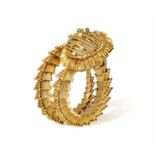 AN 18K GOLD RETRO WATCH, BY LONGINES, CIRCA 1965 The coiled textured gold serpent bracelet with