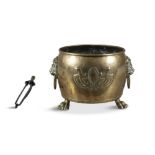 A LARGE 19TH CENTURY BRASS FUEL BUCKET, of cylindrical shape applied with twin lion mask and ring