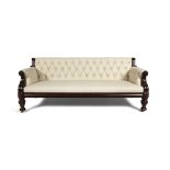 A IRISH WILLIAM IV MAHOGANY FRAMED BUTTON BACK SETTEE, of rectangular shape, covered in an cream