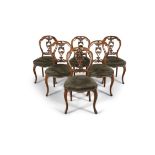A SET OF SIX VICTORIAN DINING CHAIRS, the balloon backs with carved splat, grey stripped