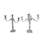 A PAIR OF SILVER PLATED CANDLESTICKS, 20th century, in the shape of a column with shaped-circular