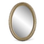 A 20TH CENTURY OVAL GILTWOOD MIRROR, the oval plate enclosed with beaded rim and foliate frame.