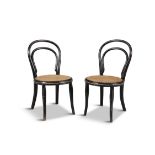 A PAIR OF CHILDREN'S LAQUERED BENTWOOD CHAIRS, with canework seats. 63cm high