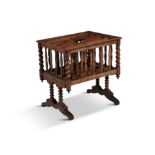 A VICTORIAN MAHOGANY CANTERBURY, formed in the shape of a cradle, with four slatted compartments