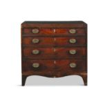 A GEORGE III MAHOGANY COMPACT CHEST OF DRAWERS, the crossbanded rectangular top above four long