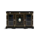 A 19TH CENTURY BRASS MOUNTED EBONISED BREAKFRONT CREDENZA, the plain top with moulded rim above