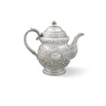 AN IRISH GEORGE IV SILVER TEA POT, Dublin C. 1824, maker's mark of Edward Crofton,