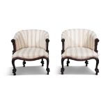 A PAIR OF MAHOGANY FRAMED AND UPHOLSTERED EASY ARMCHAIRS, 19th century, each covered in a striped