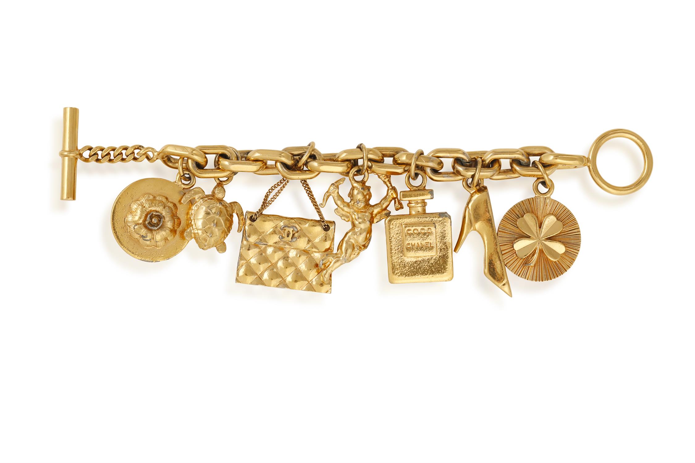 A GOLD COLOUR COSTUME CHARM BRACELET BY CHANEL, WITH A BANGLE BY FREY, the fancy-link large chain - Image 2 of 3