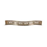 A GEORGE III BRASS SERPENTINE CURB FENDER, with beaded rim and pierced arcading and wave and