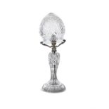 A WATERFORD CUT GLASS TABLE LAMP, the domed top with diamond cut banding, raised on a baluster