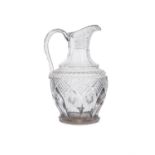 AN IRISH REGENCY CUT GLASS WATER PITCHER WITH STEP-CUT NECK, faceted shoulders, with diamond and